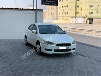 Mitsubishi  Lancer  EX  2015  Sedan  Automatic  4  139,800  FWD  White  Gasoline