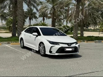 Toyota  Corolla  XLI  2020  Sedan  Automatic  4  69,000  FWD  White  Gasoline