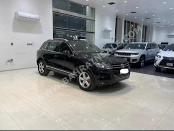 Volkswagen  Touareg  2012  SUV  Automatic  6  181,600  AWD  Black  Gasoline