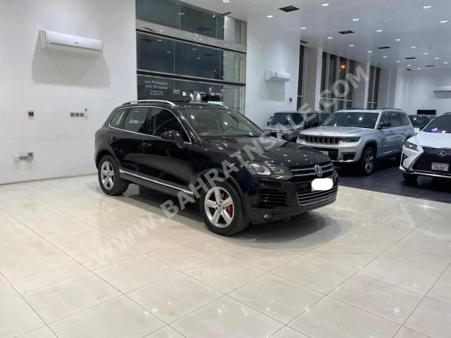 Volkswagen  Touareg  2012  SUV  Automatic  6  181,600  AWD  Black  Gasoline