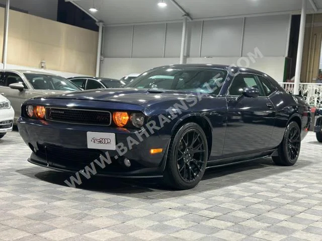 Dodge  Challenger  R/T  2012  Coupe / Sport  Automatic  6  200,000  RWD  Dark Blue  Gasoline