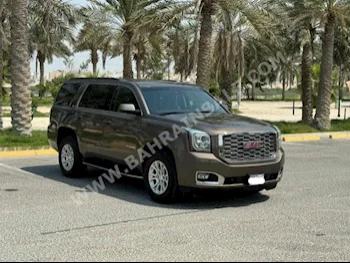 GMC  Yukon  2016  SUV  Automatic  8  132,450  RWD  Brown  Gasoline