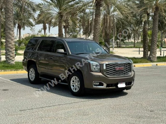 GMC  Yukon  2016  SUV  Automatic  8  132,450  RWD  Brown  Gasoline