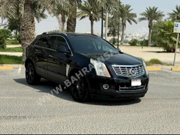 Cadillac  SRX  2013  SUV  Automatic  6  173,750  RWD  Black  Gasoline