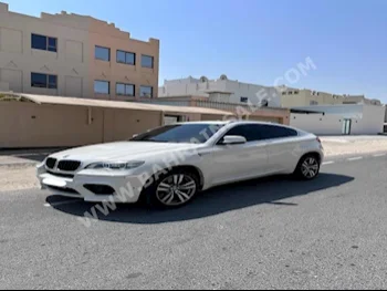 BMW  X-Series  6 M  2014  SUV  Automatic  8  160,000  RWD  White  Gasoline