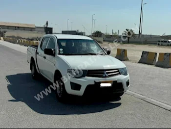 Mitsubishi  L 200  2015  Pick Up  Manual  4  96,100  RWD  White  Gasoline