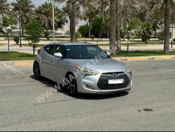 Hyundai  Veloster  2014  Hatchback  Automatic  4  204,400  FWD  Silver  Gasoline