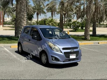 Chevrolet  Spark  2015  Hatchback  Automatic  4  94,400  FWD  Blue  Gasoline