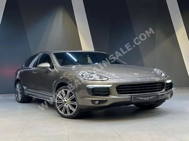 Porsche  Cayenne  2016  SUV  Automatic  6  87,000  AWD  Brown  Diesel