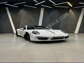 Porsche  carrera  911 TURBO S  2013  Coupe / Sport  Manual  6  112,000  4WD  White & Black  Diesel