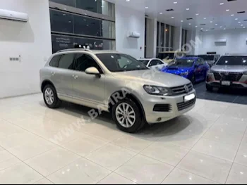 Volkswagen  Touareg  2014  SUV  Automatic  6  167,500  AWD  Gold  Gasoline
