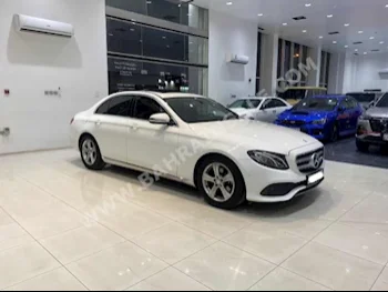 Mercedes-Benz  E-Class  200  2017  Sedan  Automatic  4  85,000  FWD  White  Gasoline