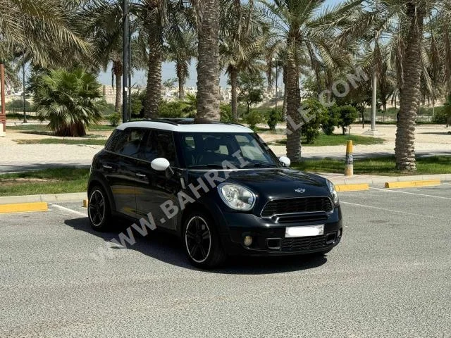 Mini  Cooper  S  2011  Hatchback  Automatic  4  104,500  RWD  Black  Gasoline