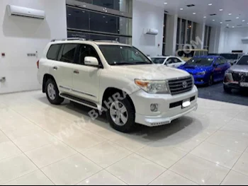Toyota  Land Cruiser  GXR  2014  SUV  Automatic  8  305,950  AWD  White  Gasoline