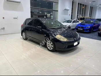 Nissan  Tiida  2007  Hatchback  Automatic  4  250,000  FWD  Black  Gasoline
