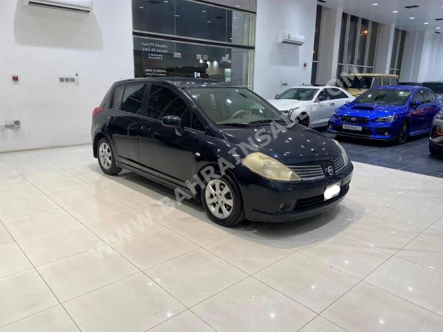 Nissan  Tiida  2007  Hatchback  Automatic  4  250,000  FWD  Black  Gasoline