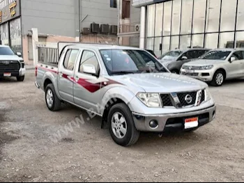 Nissan  Navaro  2013  Pick Up  Automatic  4  131,450  RWD  Silver  Gasoline