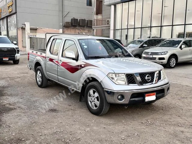Nissan  Navaro  2013  Pick Up  Automatic  4  131,450  RWD  Silver  Gasoline
