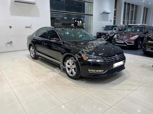Volkswagen  Passat  2013  Sedan  Automatic  5  144,100  RWD  Black  Gasoline