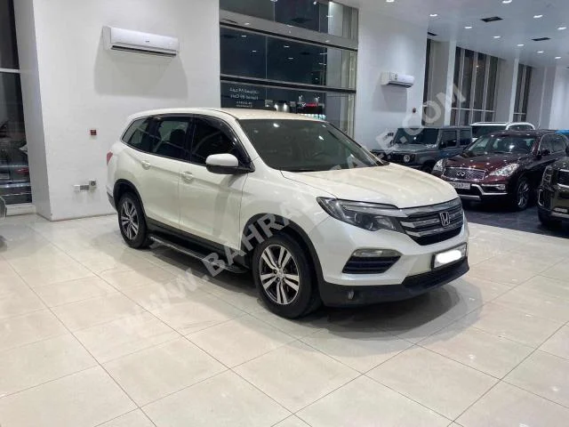 Honda  Pilot  2017  SUV  Automatic  6  219,500  RWD  White  Gasoline