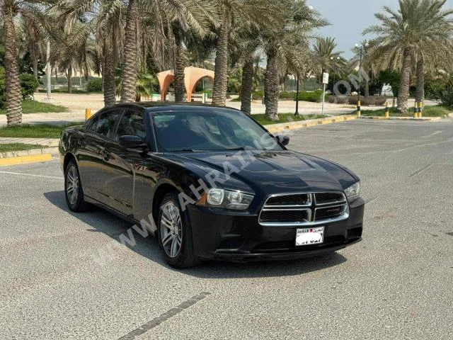دودج  تشارجر  2013  سيدان  اتوماتك  6  123,600  دفع خلفي  بيج  بنزين