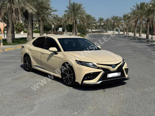 Toyota  Camry  LE  2020  Sedan  Automatic  4  97,300  FWD  Beige  Gasoline