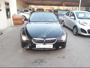 بي ام دبليو  الفئة - السادسة  645 Ci  2005  كوبيه \ سبورت  اتوماتك  8  153,000  دفع أمامي  أسود  بنزين