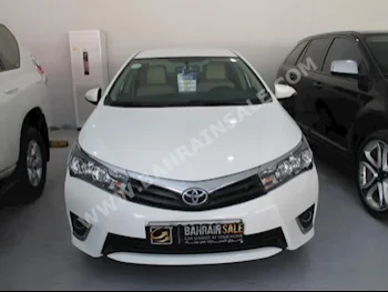 Toyota  Corolla  XLI  2015  Sedan  Automatic  4  49,000  FWD  White  Gasoline