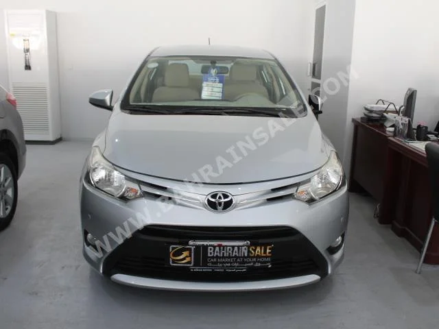 Toyota  Yaris  2014  Sedan  Automatic  4  94,000  FWD  Silver  Gasoline