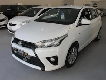 Toyota  Yaris  2015  Hatchback  Automatic  4  53,000  FWD  White  Gasoline