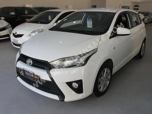 Toyota  Yaris  2015  Hatchback  Automatic  4  53,000  FWD  White  Gasoline