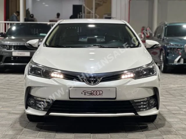 Toyota  Corolla  XLI  2019  Sedan  Automatic  4  120,000  FWD  White  Gasoline