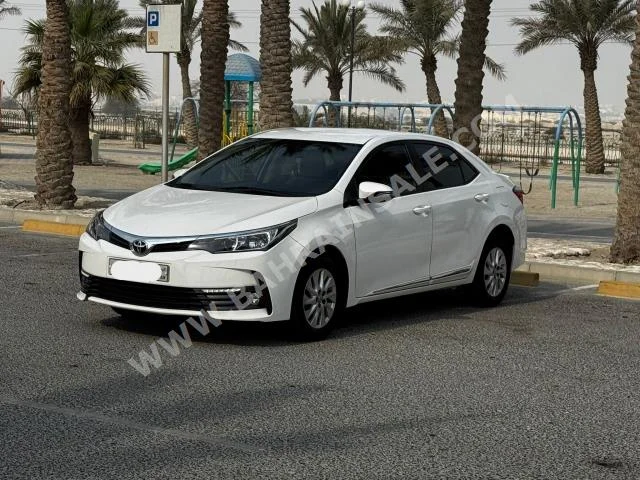 Toyota  Corolla  XLI  2018  Sedan  Automatic  4  238,600  FWD  White  Gasoline