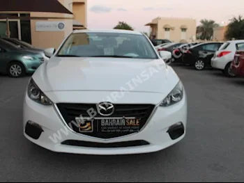 Mazda  Mazda 3  2015  Sedan  Automatic  4  64,000  FWD  White  Gasoline