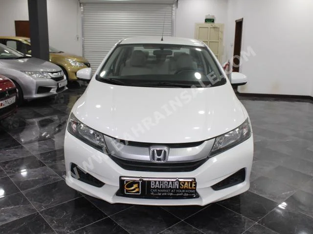 Honda  City  2014  Sedan  Automatic  4  58,000  FWD  White  Gasoline