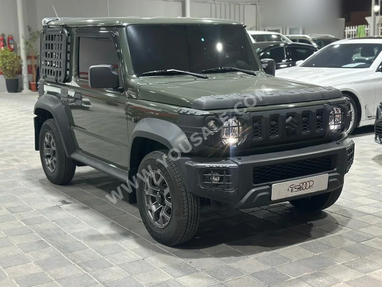 Suzuki  Jimny  2025  Automatic  10,000 KM  4 Cylinder  SUV  Dark Green