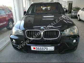 BMW  X-Series  5  2009  SUV  Automatic  6  120,000  4WD  Black  Gasoline