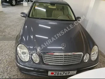 Mercedes-Benz  E-Class  280  2006  Sedan  Automatic  6  154,000  RWD  Gray  Gasoline