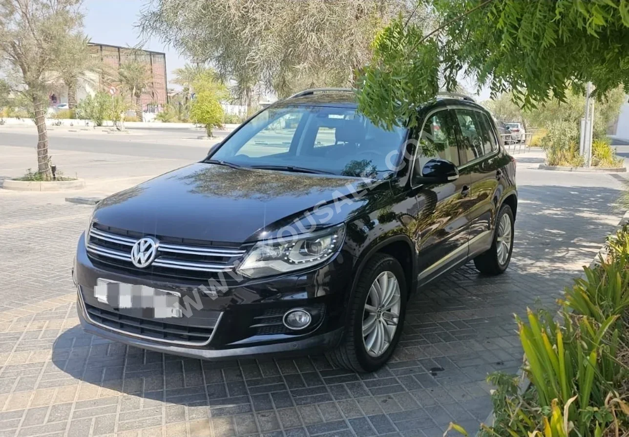 Volkswagen  TIGUAN  2.0 TSI  2014  Automatic  120,000 KM  4 Cylinder  SUV  Black