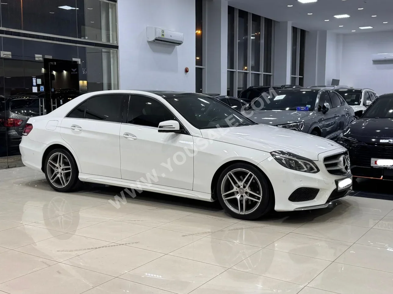 Mercedes-Benz  E-Class  300 AMG  2015  Automatic  140,700 KM  6 Cylinder  Sedan  White