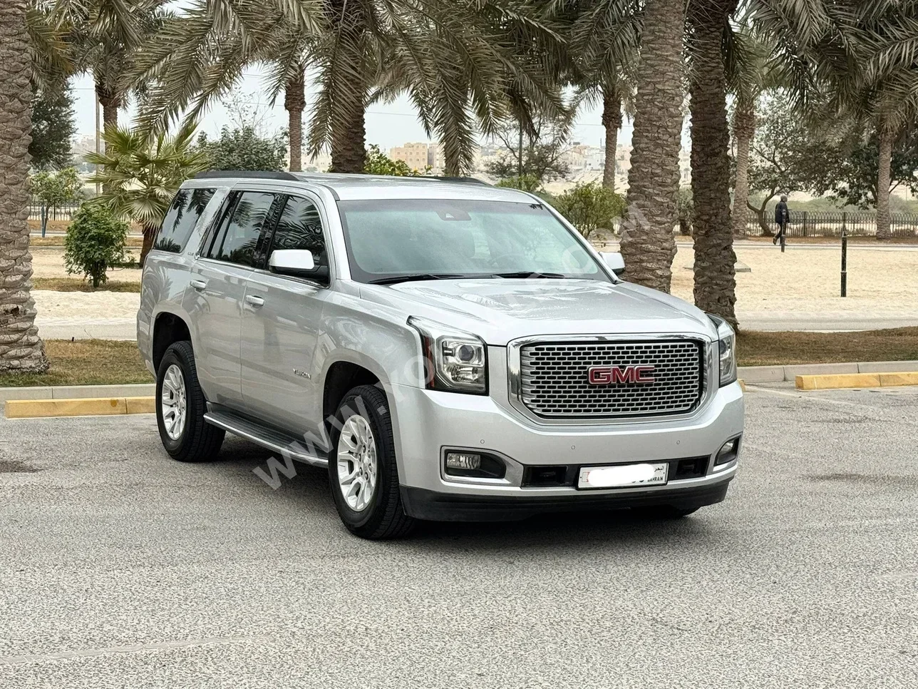 GMC  Yukon  SLE  2016  Automatic  150,000 KM  8 Cylinder  SUV  Silver