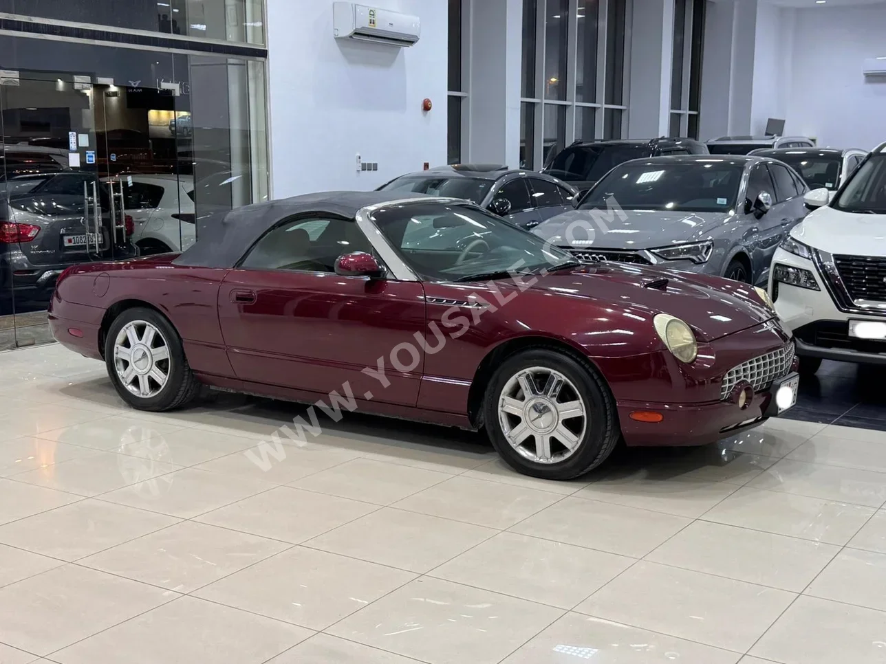 Ford  Thunderbird  2004  Automatic  99,000 KM  8 Cylinder  Sedan  Maroon