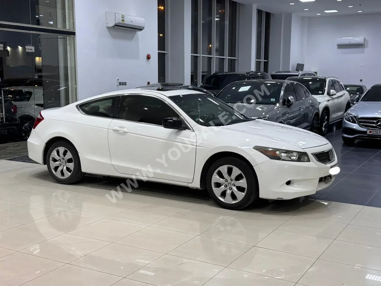 Honda  Accord  Coupe  2009  Automatic  169,500 KM  4 Cylinder  Sedan  White