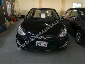 Hyundai  Accent  1.6  2012  Sedan  Automatic  4  117,000  FWD  Black  Gasoline