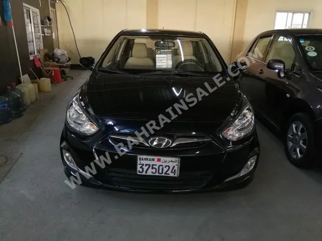 Hyundai  Accent  1.6  2012  Sedan  Automatic  4  117,000  FWD  Black  Gasoline