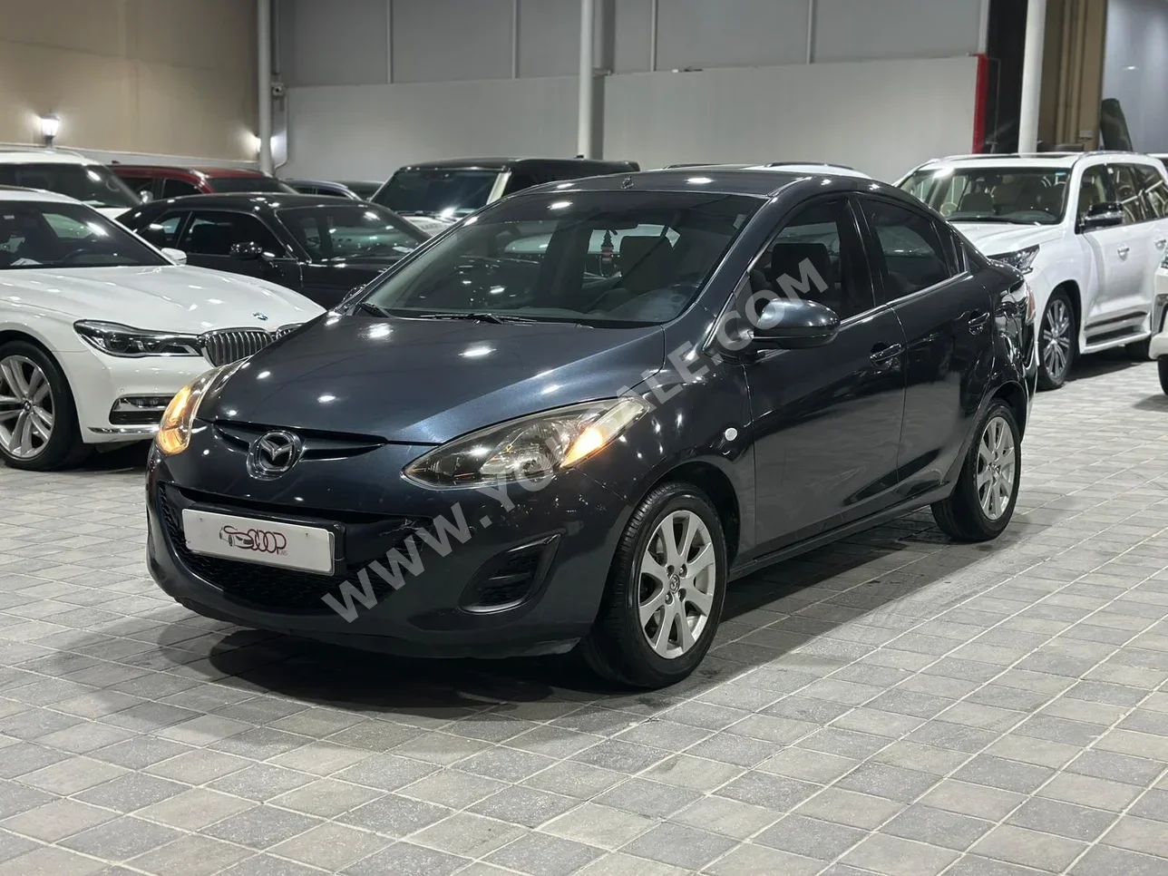 مازدا  مازدا 2  2014  اتوماتك  185,000 كم  4 سلندر  سيدان  رمادي