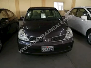 Nissan  Tiida  2008  Sedan  Automatic  4  149,000  FWD  Gray  Gasoline