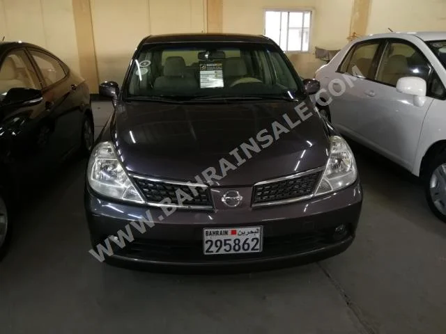 Nissan  Tiida  2008  Sedan  Automatic  4  149,000  FWD  Gray  Gasoline