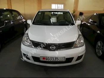 Nissan  Tiida  2011  Sedan  Automatic  4  117,000  FWD  White  Gasoline