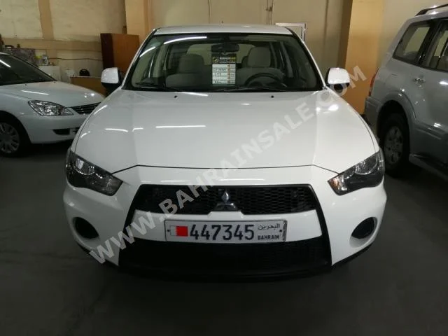Mitsubishi  Outlander  2013  SUV  Automatic  4  77,000  FWD  White  Gasoline